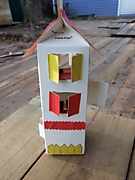 Домик из пакета молока, украшенный цветной бумагой